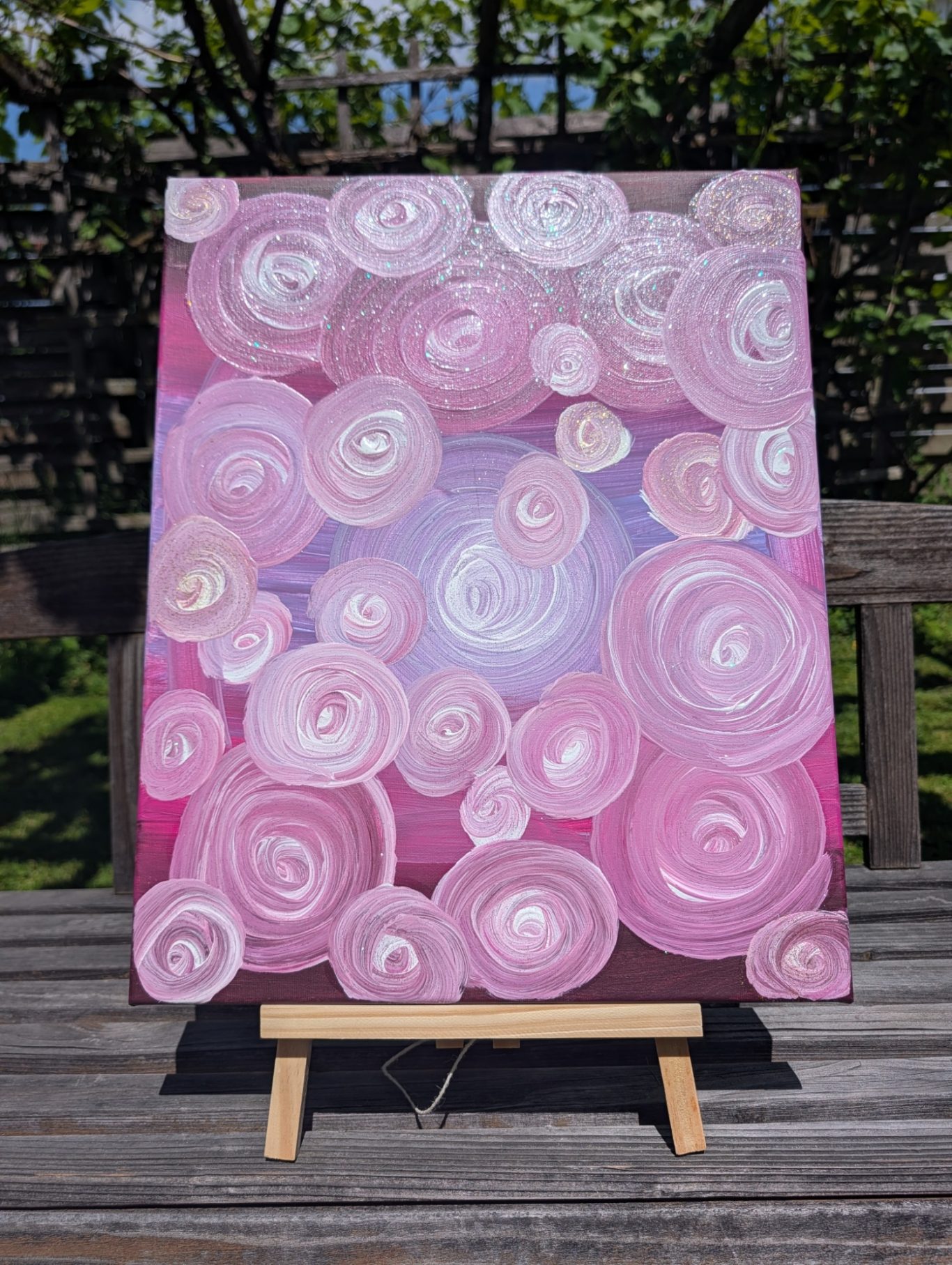 Rosenträume Abstrakte Darstellung von rosa Kreisen auf lila Hintergrund, fröhlich und lebhaft.